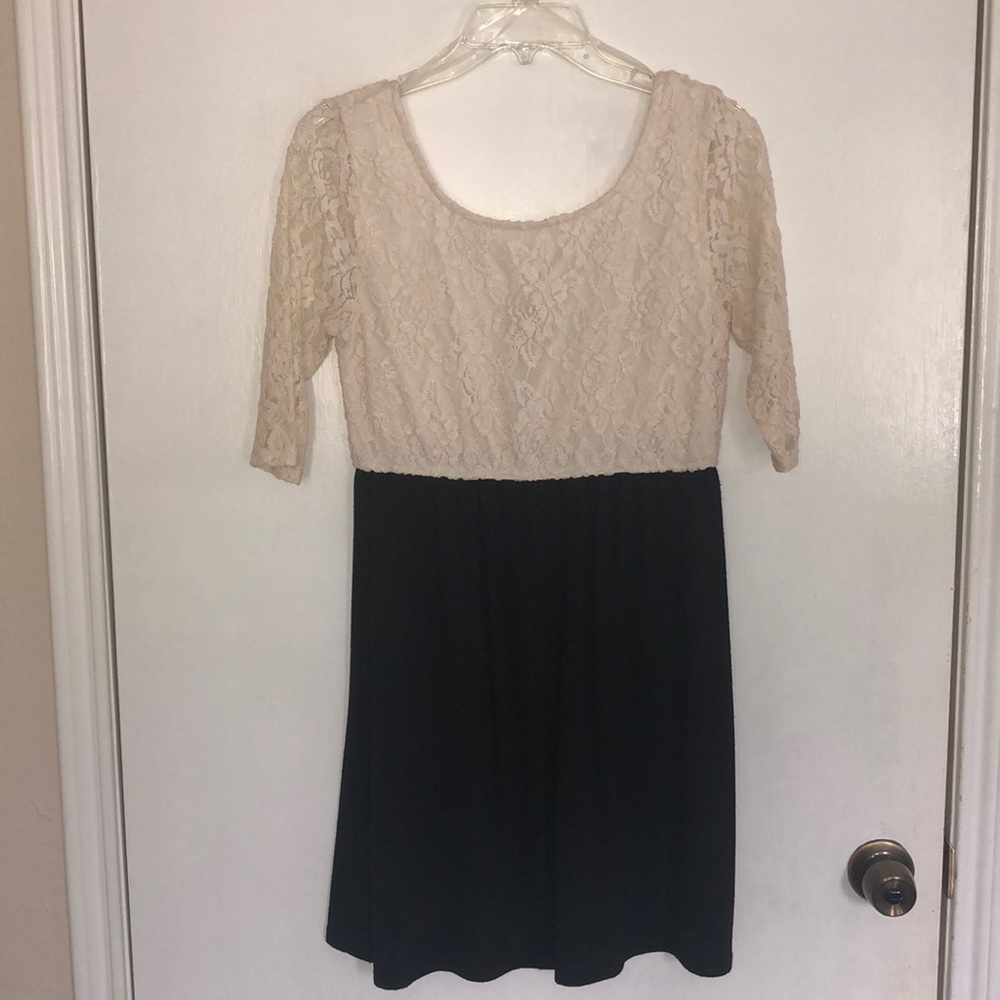 Cream lace and black dress